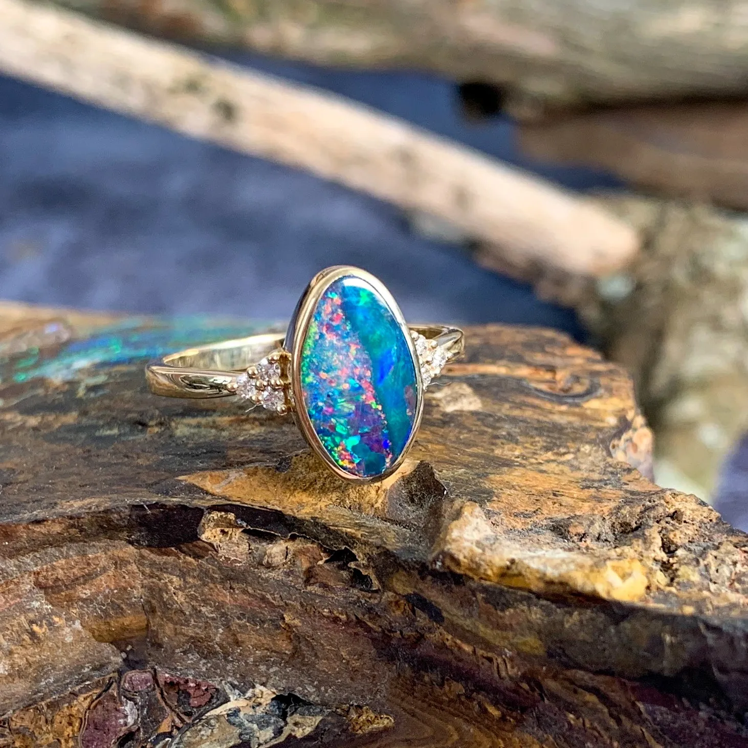 14kt Yellow Gold Oval freeform Red and Green Opal doublet with diamonds ring
