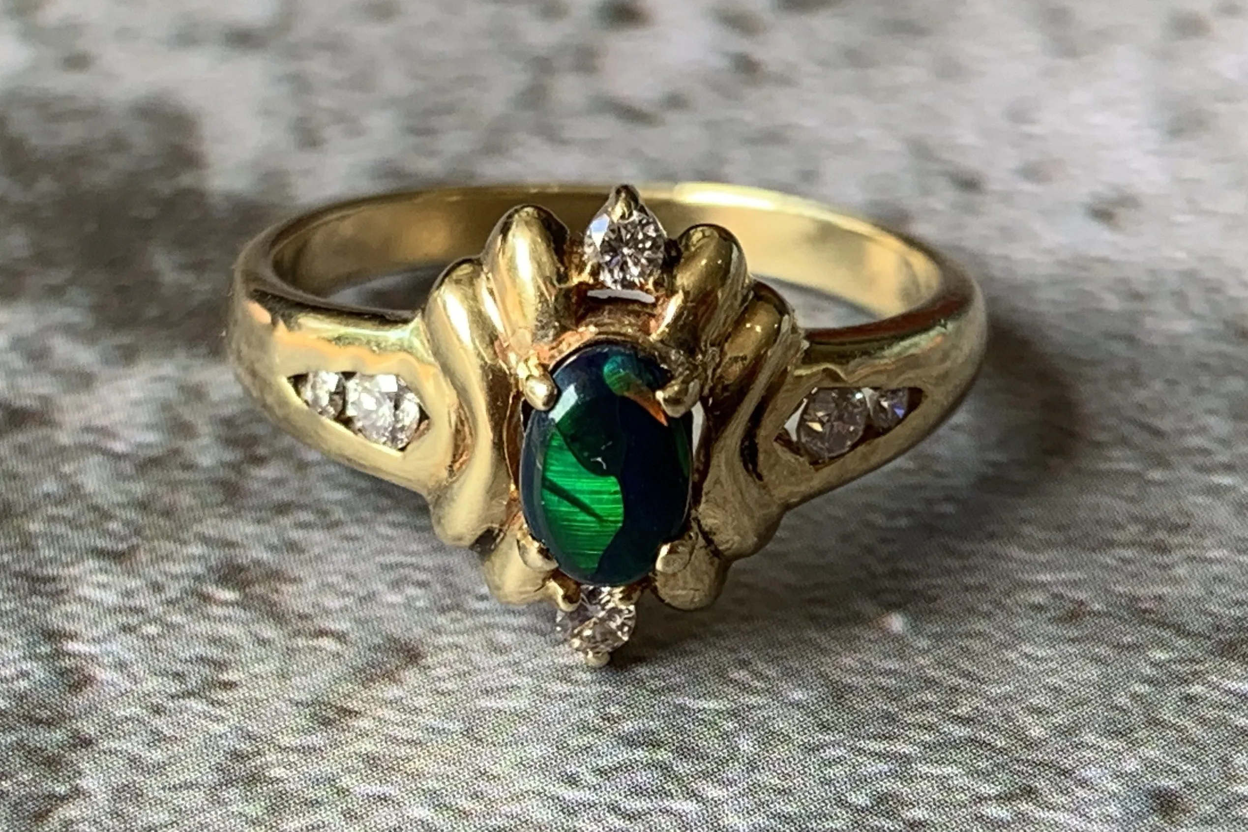 18kt Yellow Gold Black Opal and Diamond ring