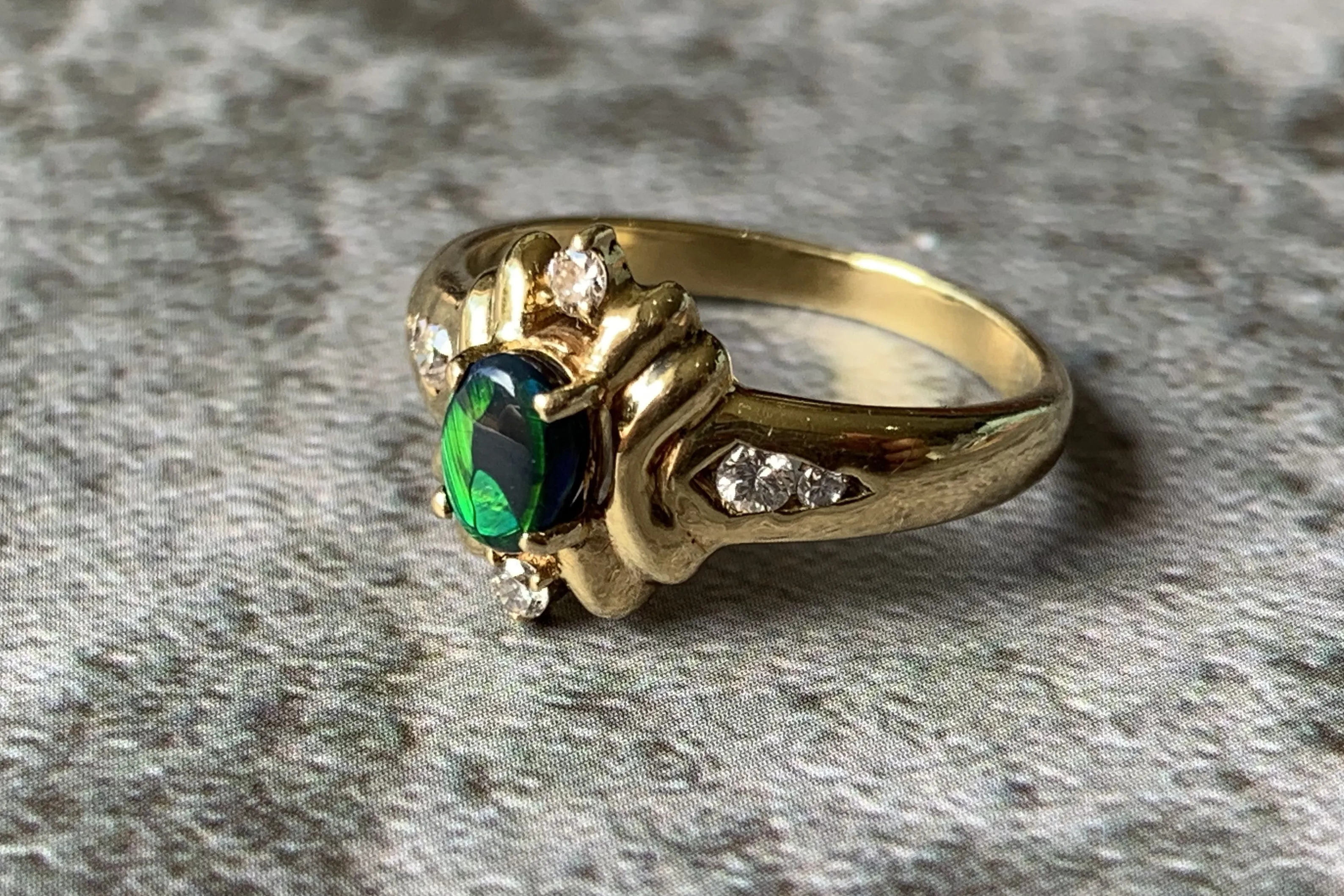 18kt Yellow Gold Black Opal and Diamond ring