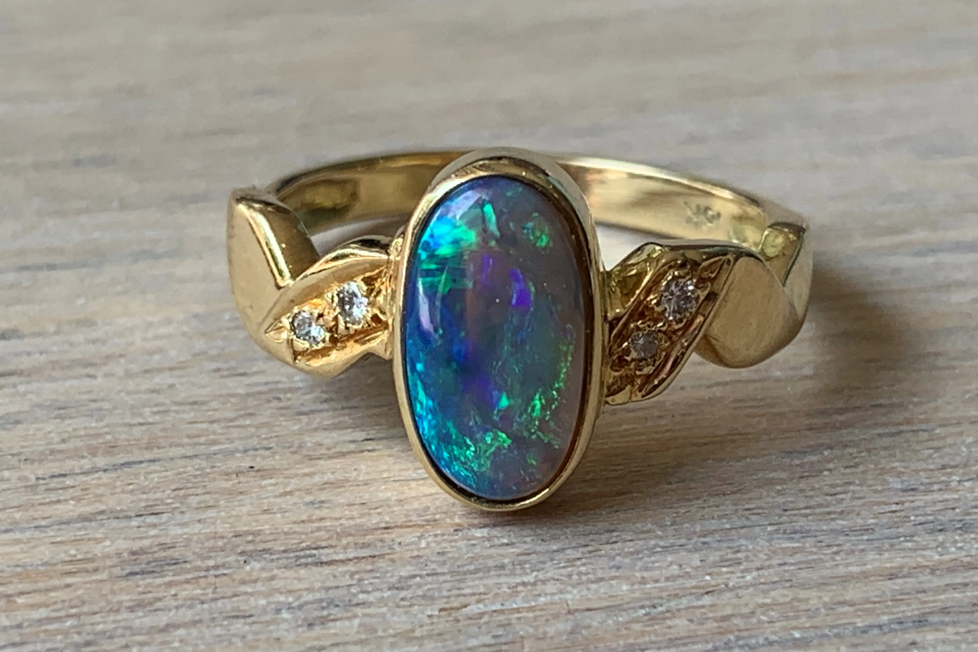 18kt Yellow Gold Black Opal and Diamond ring