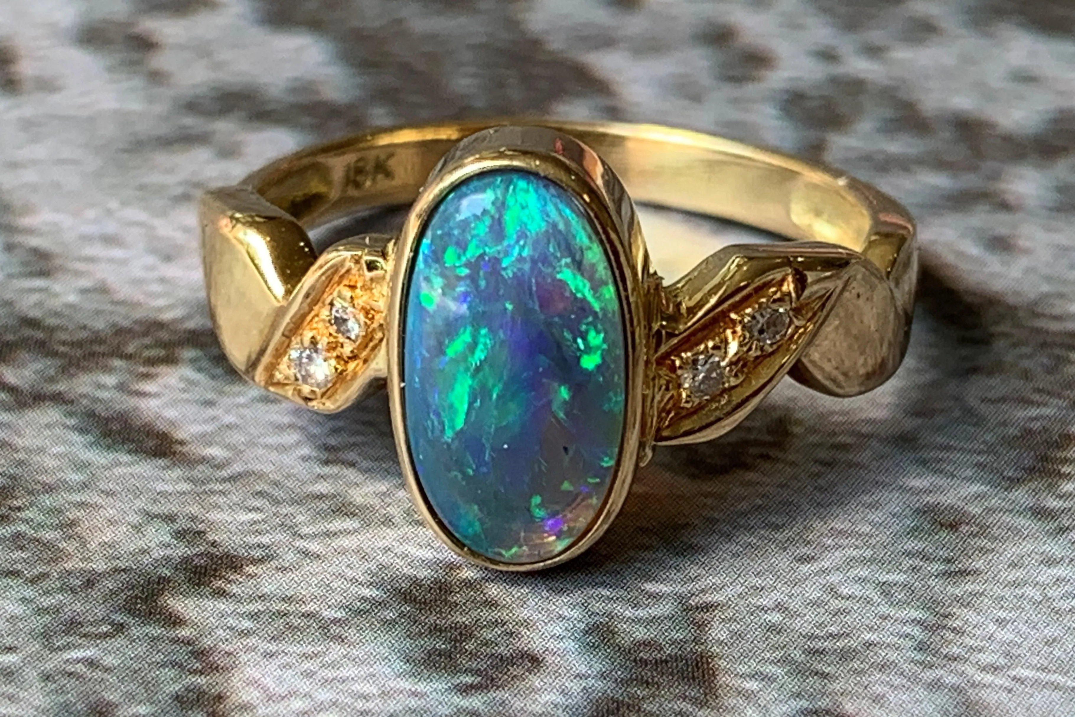 18kt Yellow Gold Black Opal and Diamond ring