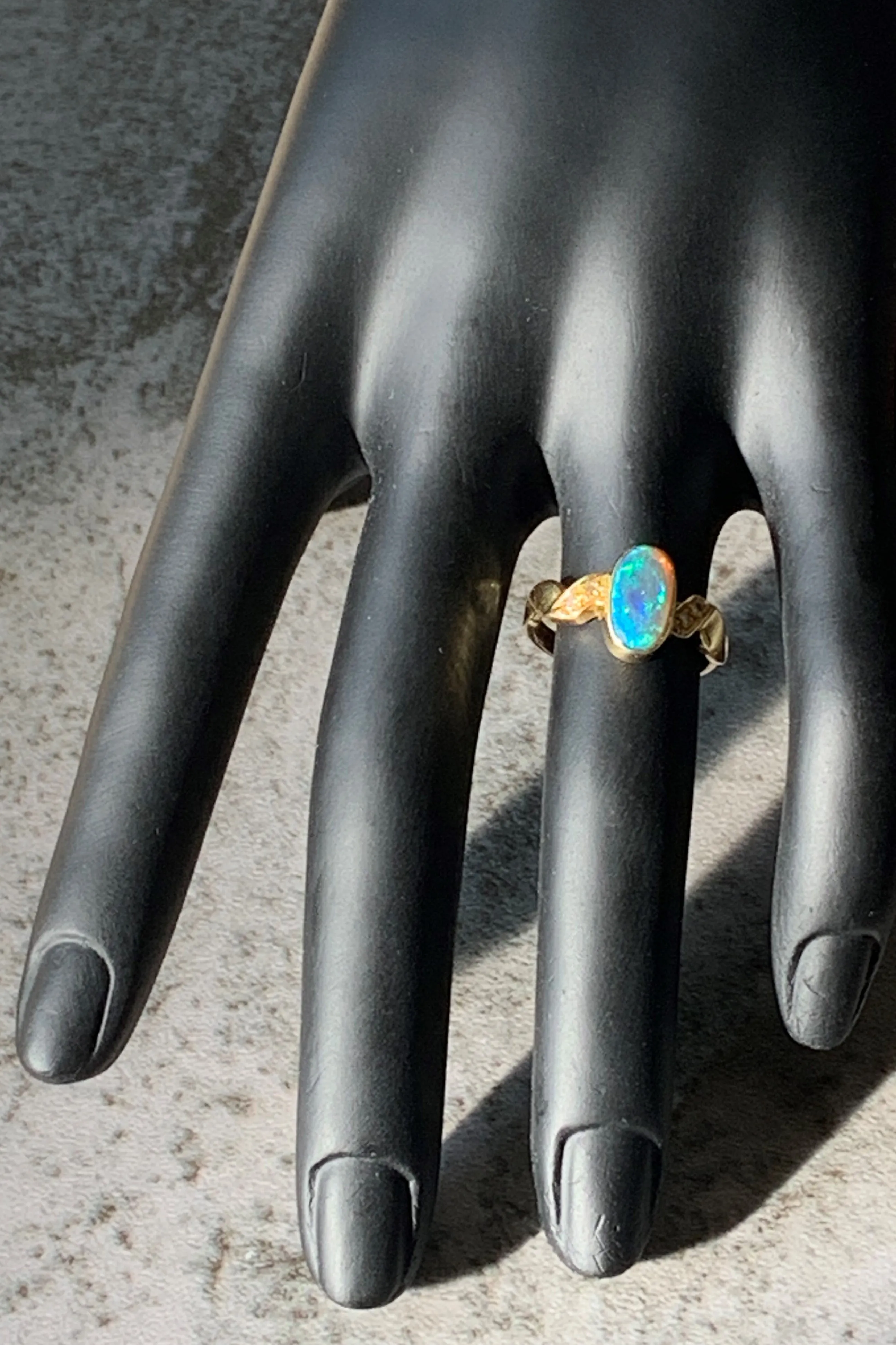 18kt Yellow Gold Black Opal and Diamond ring