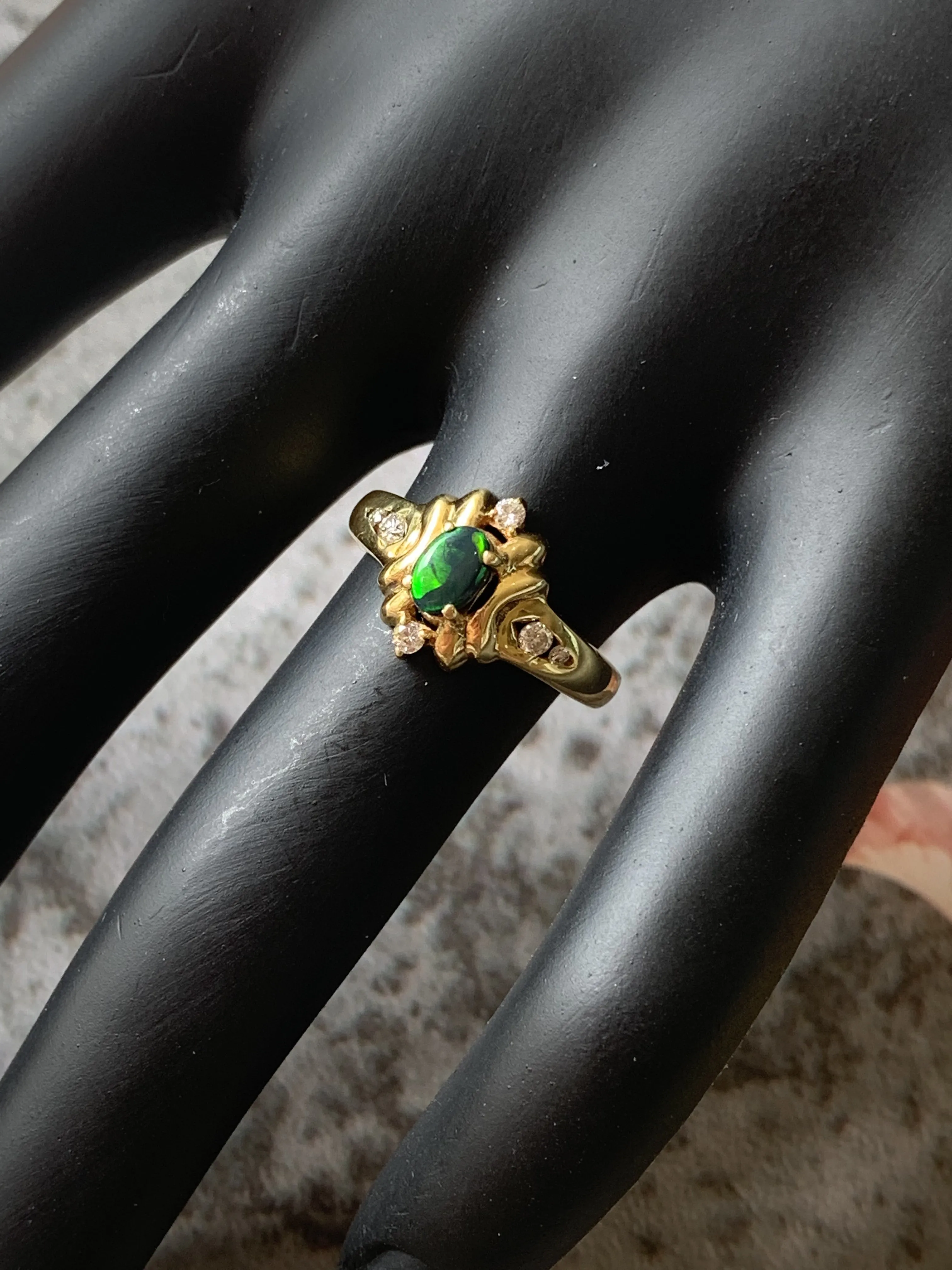 18kt Yellow Gold Black Opal and Diamond ring