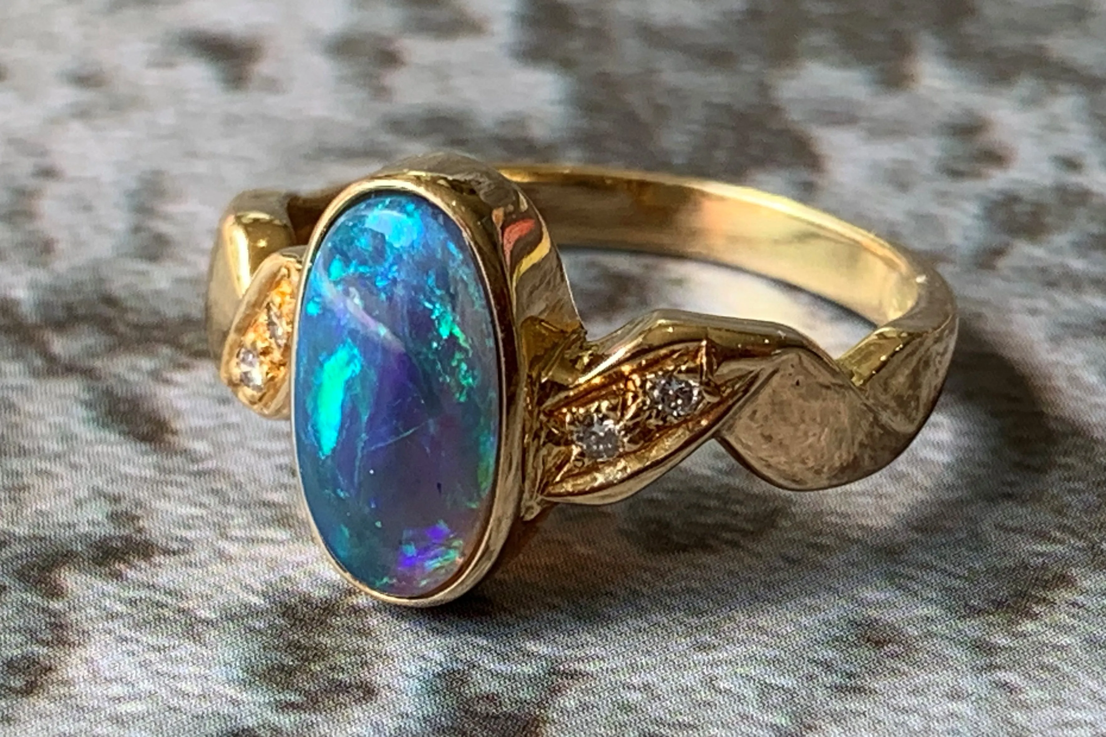 18kt Yellow Gold Black Opal and Diamond ring
