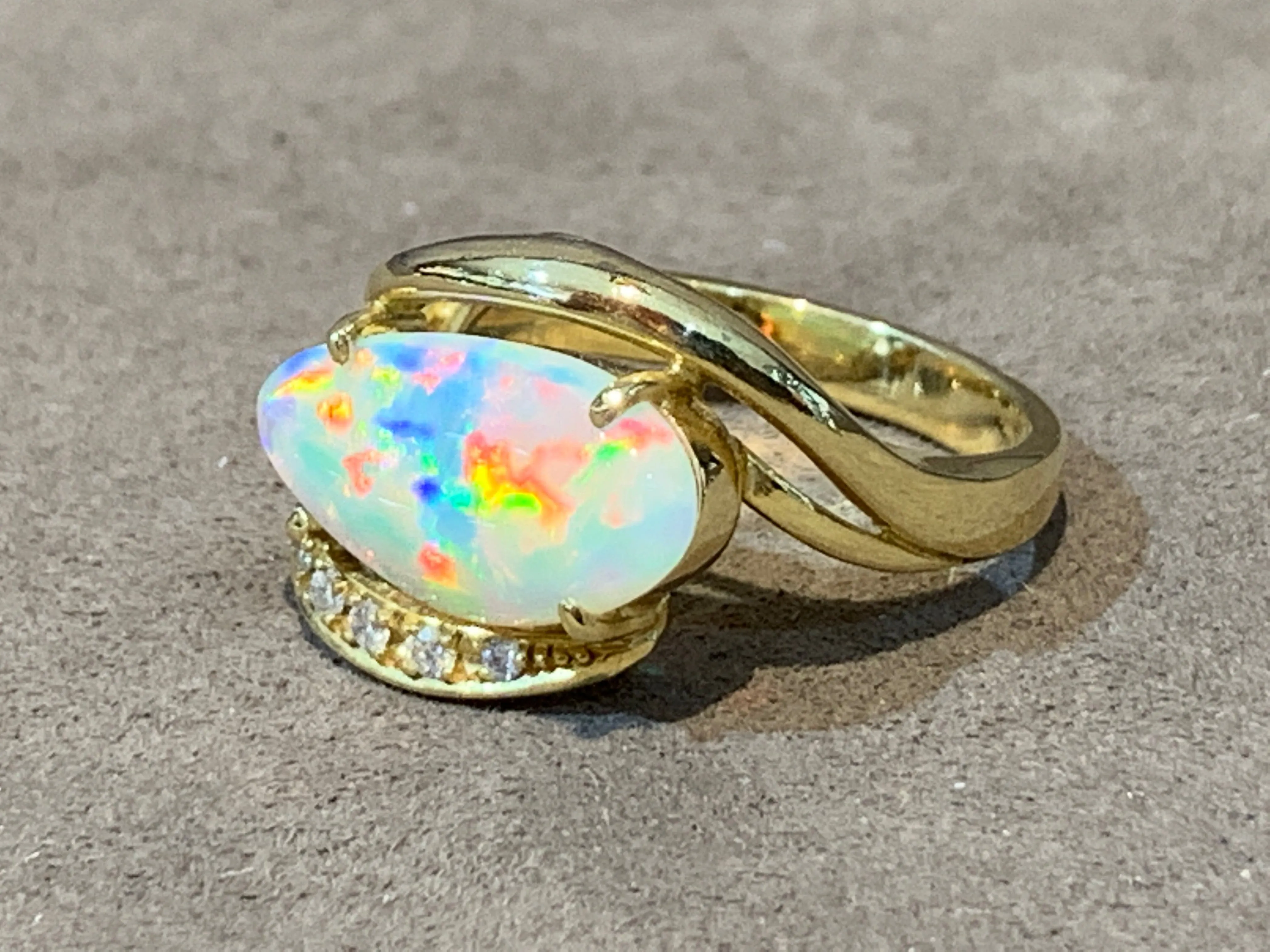 18KT YELLOW GOLD OPAL AND DIAMOND RING