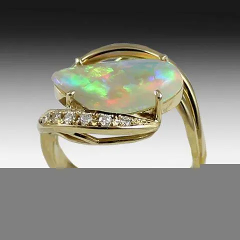 18KT YELLOW GOLD OPAL AND DIAMOND RING
