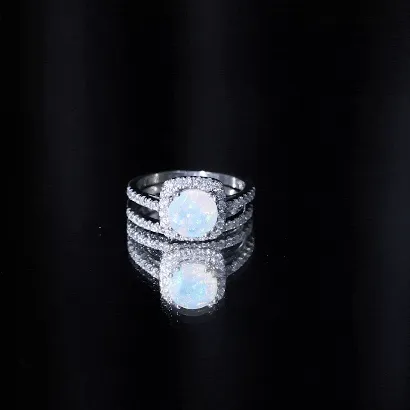 3.25 CT Ethiopian Opal and Moissanite Halo Ring Set in Gold