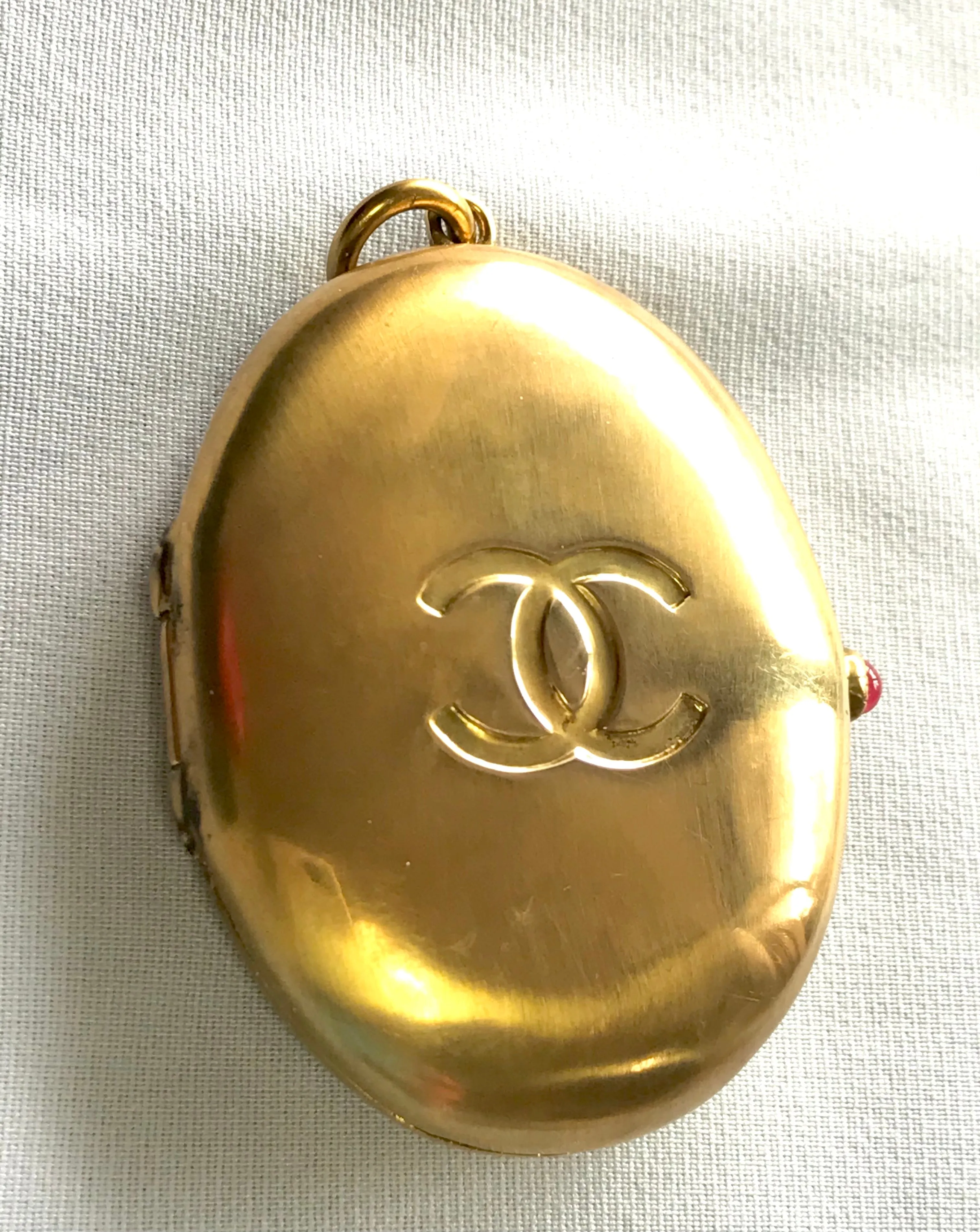 90’s Vintage Chanel Locket pendant top with CC engraved mark.