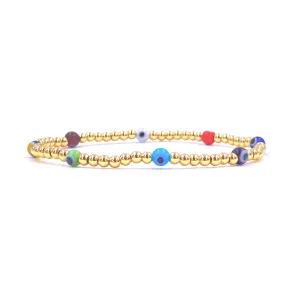 Ashley Gold Stainless Steel Gold Plated Stretch Evil Eye 4mm Ball Beaded Bracelet