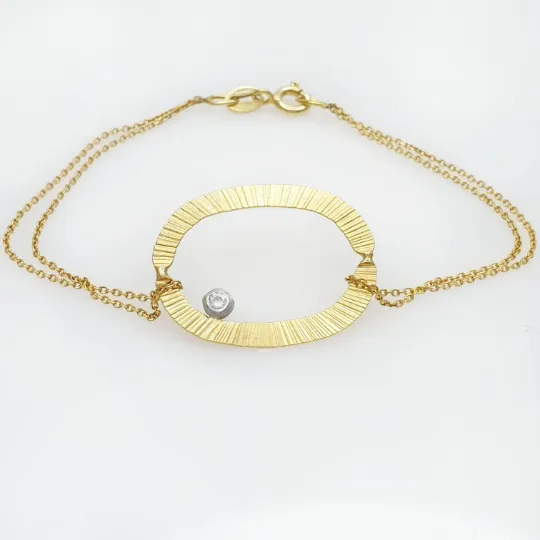 Gold Oval Bracelet With Diamond