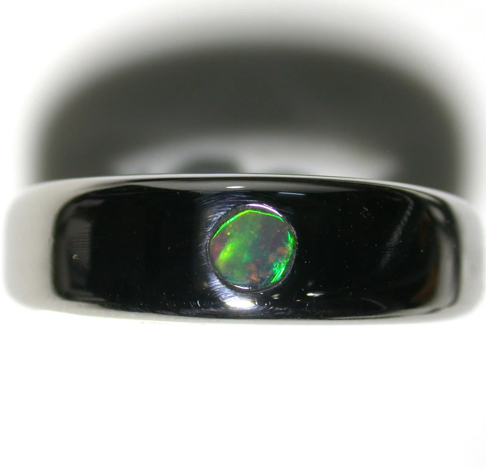 Green and multi coloured solid  boulder opal from Quilpie