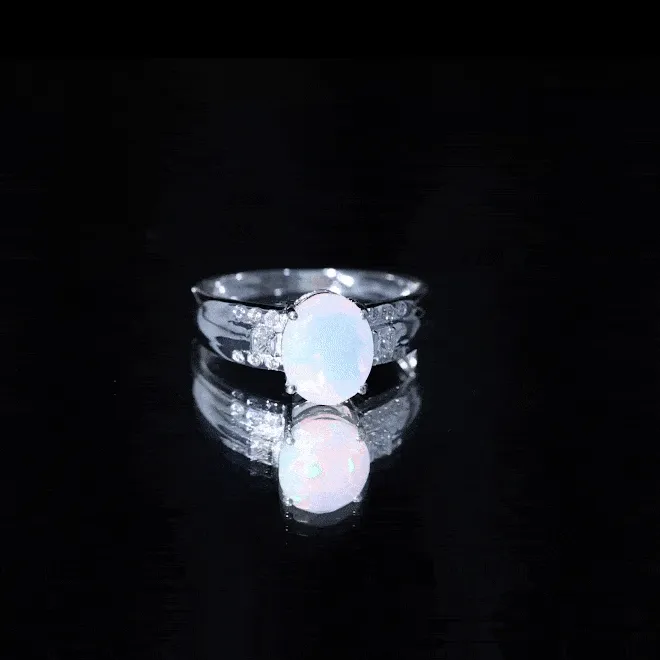Oval Ethiopian Opal Solitaire Engagement Ring with Diamond